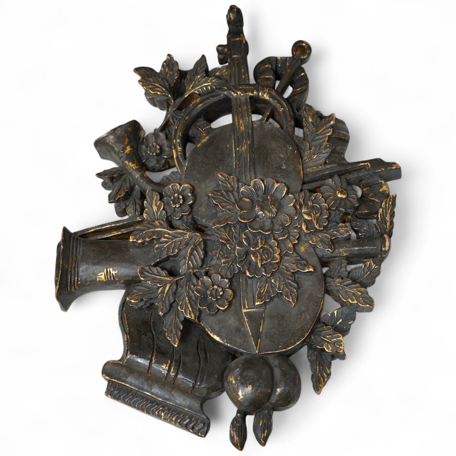 A folk art partially gilt carved panel, 50cm high